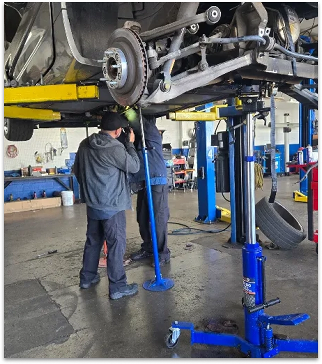 Auto repair technician working in the shop